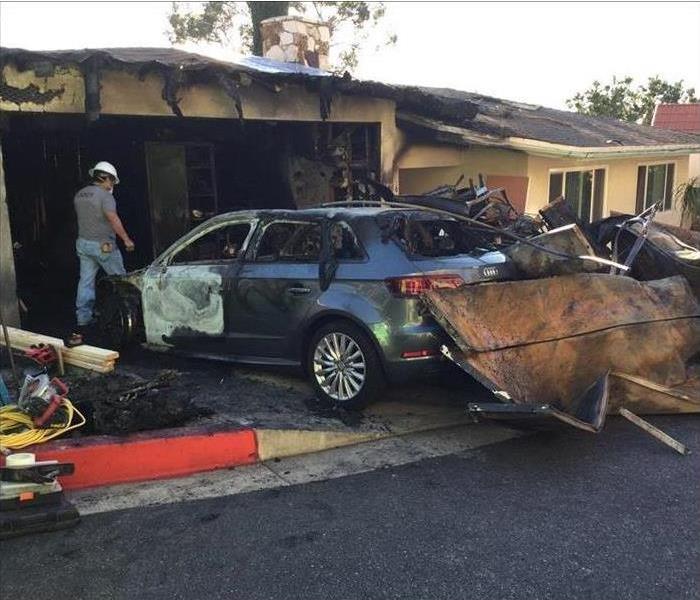 burned down garage and burned car