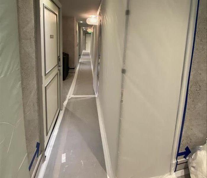 Hallway in hotel wrapped up in plastic